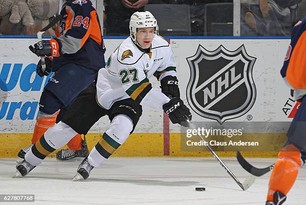 Robert Thomas of the London Knights skates with the puck against the Flint Firebirds during an OHL game at Budweiser Gardens on December 4, 2016 in...