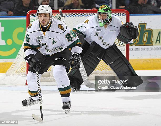 Victor Mete of the London Knights defends against the Flint Firebirds during an OHL game at Budweiser Gardens on December 4, 2016 in London, Ontario,...