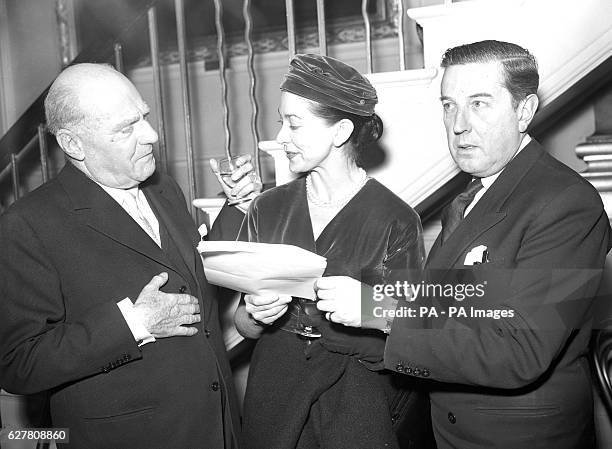 Ballerina Dame Margot Fonteyn with Dr Paul Czinner , producer of the film The Royal Ballet, and choreographer Frederick Ashton, at the reception...