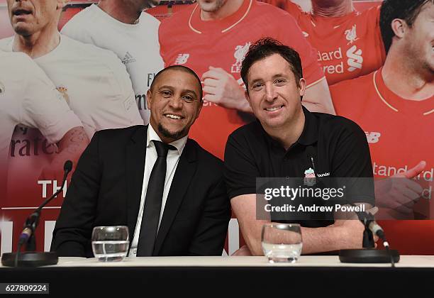 Roberto Carlos with Robbie Fowler during a 'Liverpool and Real Madrid Legends' Press Conference at Anfield on December 5, 2016 in Liverpool, England.