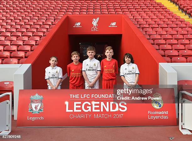 Children representing 'Legends of Liverpool and Real Madrid' during a 'Liverpool and Real Madrid Legends' Press Conference at Anfield on December 5,...