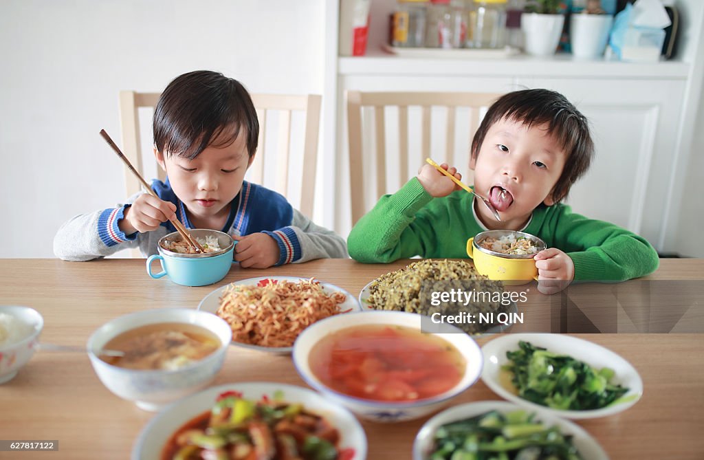 Cute child enjoying lunch