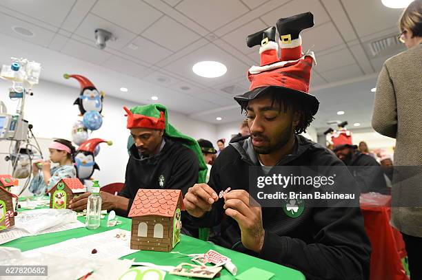 James Young of the Boston Celtics spreads holiday cheer duing a children's hospital visit on December 1, 2016 at Boston Children's Hospital in...