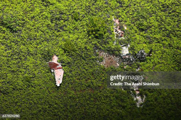 In this aerial image, debris of the Japanese Imperial Navy fighter A6M 'Zero' is seen in the field on August 29, 2016 in Babeldaob Island, Palau. The...