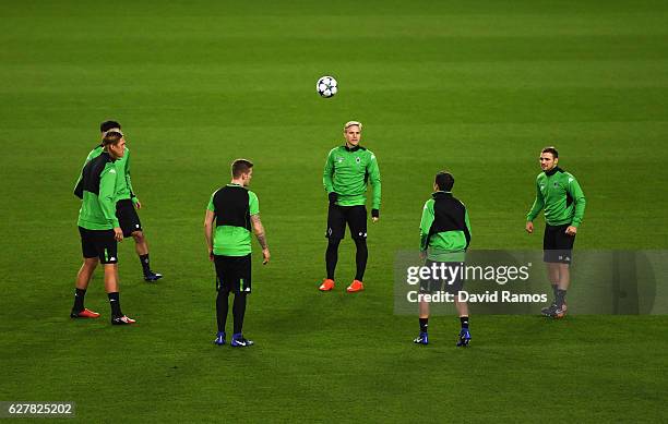 Players perform a drill during a VfL Borussia Moenchengladbach training session on the eve of their UEFA Champions League match against FC Barcelona...