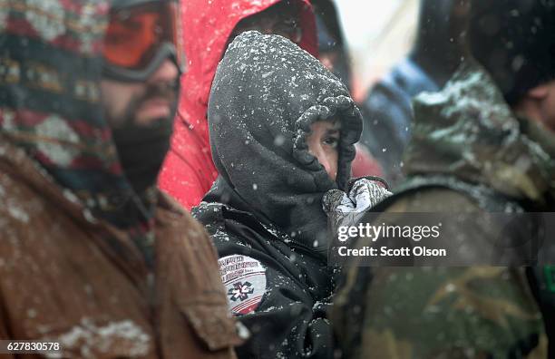 Military veterans are briefed on cold-weather safety issues and their overall role at Oceti Sakowin Camp on the edge of the Standing Rock Sioux...