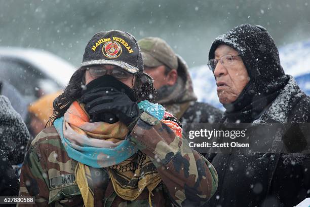 Military veterans are briefed on cold-weather safety issues and their overall role at Oceti Sakowin Camp on the edge of the Standing Rock Sioux...