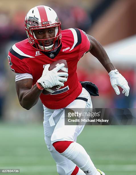 Taywan Taylor of the Western Kentucky Hilltoppers runs the ball during the game against the Louisiana Tech Bulldogs at Houchens-Smith Stadium on...