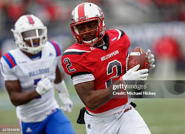 Taywan Taylor of the Western Kentucky Hilltoppers runs the ball after a reception during the game against the Louisiana Tech Bulldogs at...
