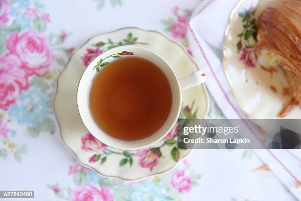 tea and croissant for breakfast - アフタヌーンティー ストックフォトと画像
