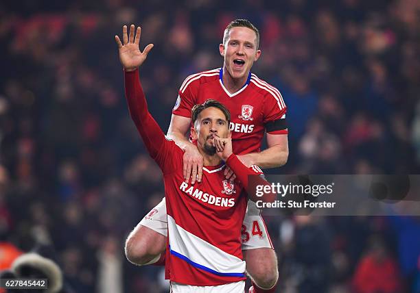 Gaston Ramirez of Middlesbrough celebrates with Adam Forshaw as he scores their first goal during the Premier League match between Middlesbrough and...