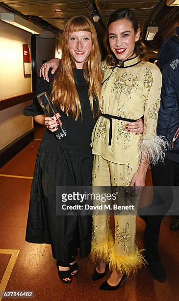 Molly Goddard, winner of the British Emerging Talent award, and Alexa Chung pose backstage at The Fashion Awards 2016 at Royal Albert Hall on...