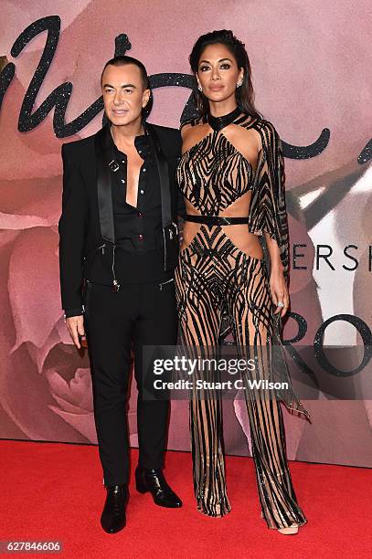 Designer Julien Macdonald and singer Nicole Scherzinger attend The Fashion Awards 2016 on December 5, 2016 in London, United Kingdom.