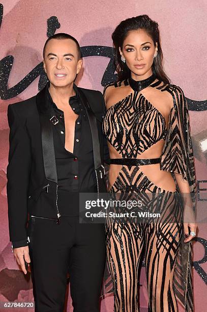 Designer Julien Macdonald and singer Nicole Scherzinger attend The Fashion Awards 2016 on December 5, 2016 in London, United Kingdom.