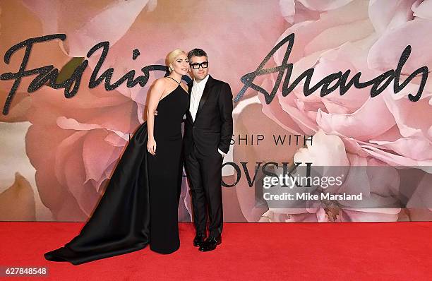 Lady Gaga and Brandon Maxwell attend The Fashion Awards 2016 on December 5, 2016 in London, United Kingdom.