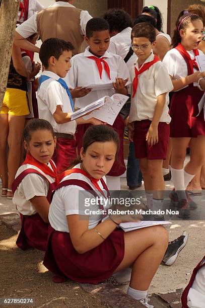 Cuban pioneers or school children attending a the traditional Book Fair in Santa Clara. The fair happens on a yearly basis.
