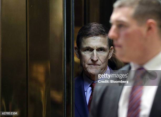 Retired Lieutenant General Michael Flynn, White House national security adviser-designate, stands in the elevator at the Trump Tower in New York,...
