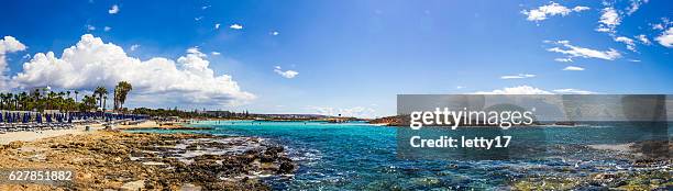 beautiful clear blue sea at nissi bay in cyprus - ayia napa stock pictures, royalty-free photos & images