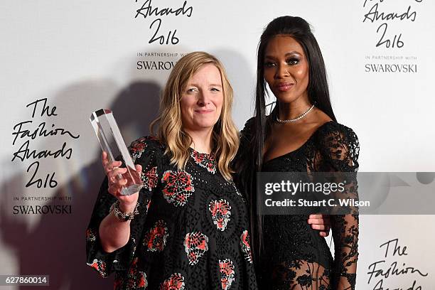 Alexander McQueen designer Sarah Burton poses in the winners room with model Naomi Campbell after winning the British Brand Award at The Fashion...