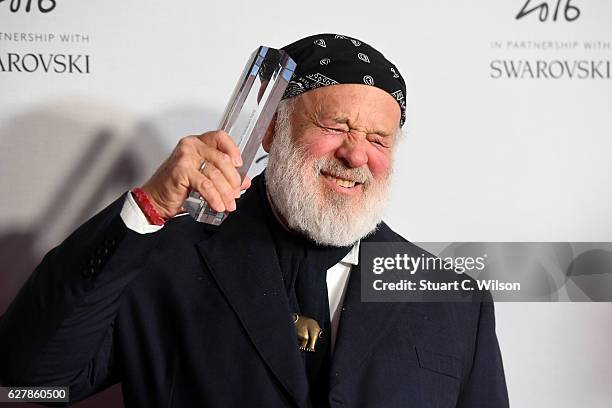 Photographer Bruce Weber poses in the winners room after winning the Isabella Blow award for fashion creator at The Fashion Awards 2016 at Royal...