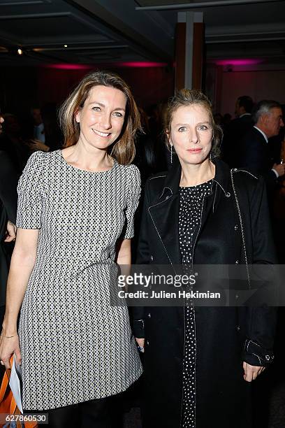 French actress Karin Viard , Laureate of the prize of the woman of influence Coup de Coeur, is pictured with French TV presenter Anne Claire Coudray...
