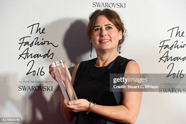 Editor-in-chief of British Vogue Alexandra Shulman poses in the winners room after winning the award for 100 Years of British Vogue at The Fashion...