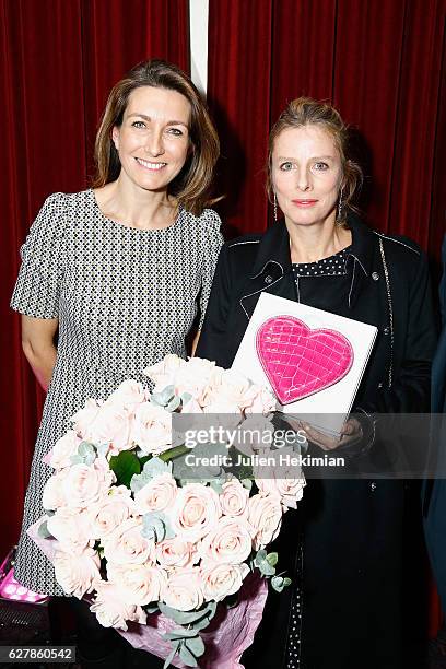 French actress Karin Viard , Laureate of the prize of the woman of influence Coup de Coeur, is pictured with French TV presenter Anne Claire Coudray...