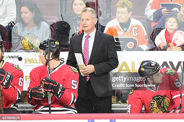 Chicago Blackhawks Assistant Coach Mike Kitchen looks on during a National Hockey League game between the Chicago Blackhawks and the Philadelphia...