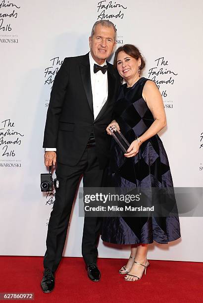 Mario Testino and Alexandra Shulman pose in the winners room at The Fashion Awards 2016 at Royal Albert Hall on December 5, 2016 in London, England.