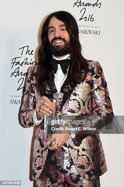 Designer Alessandro Michele poses in the winners room after winning the International Accessories Designer Award at The Fashion Awards 2016 at Royal...