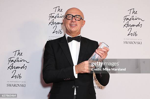 Marco Bizzarri, winner of the International Business Leader award for Gucci, poses at The Fashion Awards 2016 at Royal Albert Hall on December 5,...