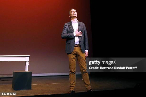 Franck Ferrand acknowledges the applause of the audience at the end of his Show "Histoires" at Theatre Antoine on December 5, 2016 in Paris, France.