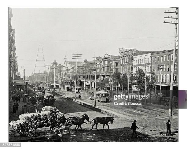 antique photograph of canal street, new orleans - new orleans streetcar stock illustrations