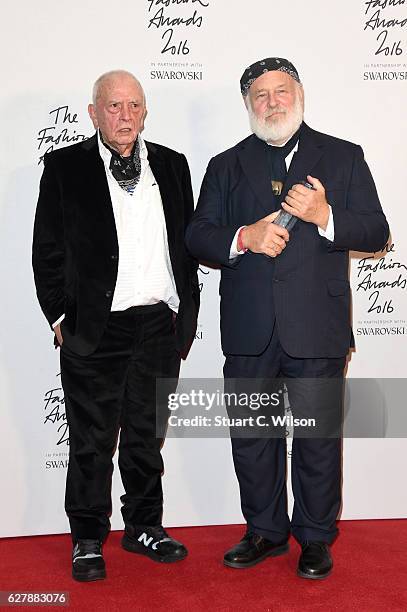 Photographer Bruce Weber poses in the winners room with presenters David Bailey after winning the Isabella Blow award for fashion creator at The...