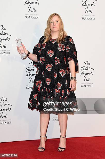 Alexander McQueen designer Sarah Burton poses in the winners room after winning the British Brand Award at The Fashion Awards 2016 at Royal Albert...