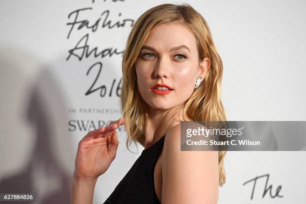 Model Karlie Kloss poses in the winners room at The Fashion Awards 2016 at Royal Albert Hall on December 5, 2016 in London, England.