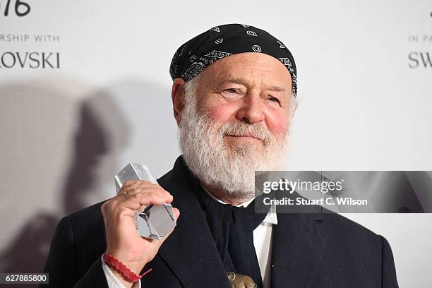 Photographer Bruce Weber poses in the winners room after winning the Isabella Blow award for fashion creator at The Fashion Awards 2016 at Royal...