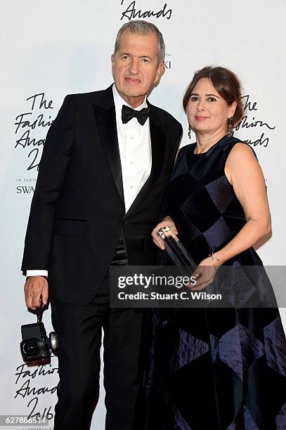 Editor-in-chief of British Vogue Alexandra Shulman poses with photographer Mario Testino in the winners room after winning the award for 100 Years of...