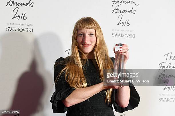 Designer Molly Goddard poses in the winners room after winning the award for British Emerging Talent at The Fashion Awards 2016 at Royal Albert Hall...