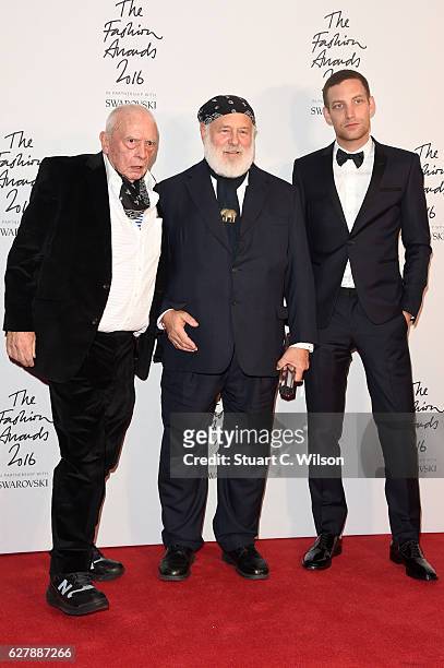 Photographer Bruce Weber poses in the winners room with presenters David Bailey and James Jagger after winning the Isabella Blow award for fashion...