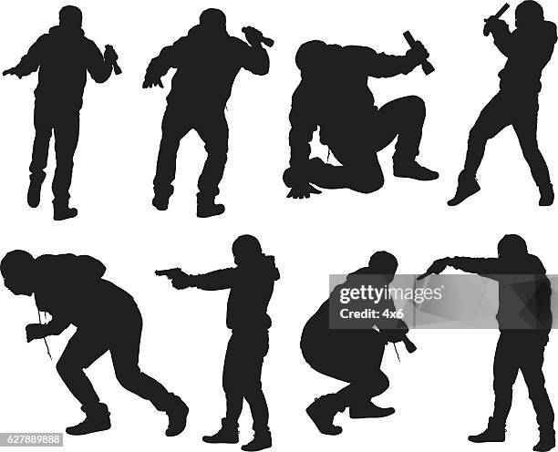 robber in action with gun and flash light - stealing stock illustrations