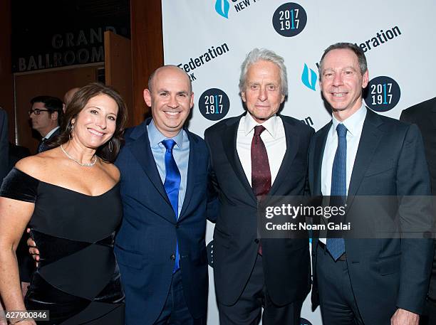Linda Solomon, Jeffrey M. Solomon, actor Michael Douglas and Jeffrey Aronson attend the 2016 UJA-Federation of New York Wall Street Dinner at New...