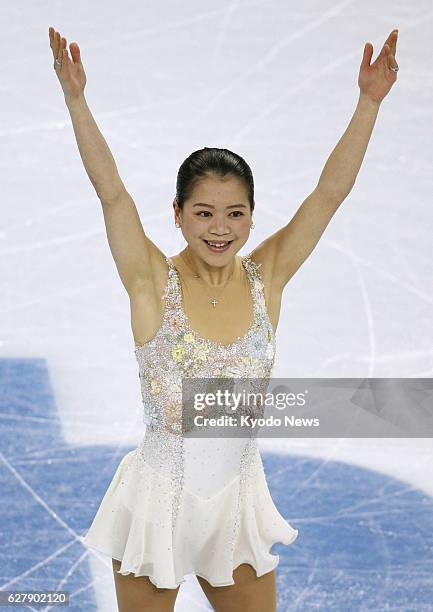 Russia - Team captain Akiko Suzuki of Japan responds to the crowd after performing in the women's free skating segment of the Winter Olympics figure...