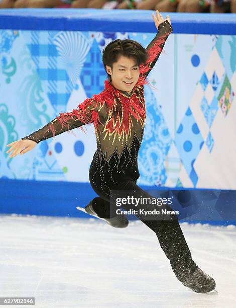 Russia - Tatsuki Machida of Japan, winner of the Cup of Russia and Skate America, performs during the men's free skating segment of the Winter...