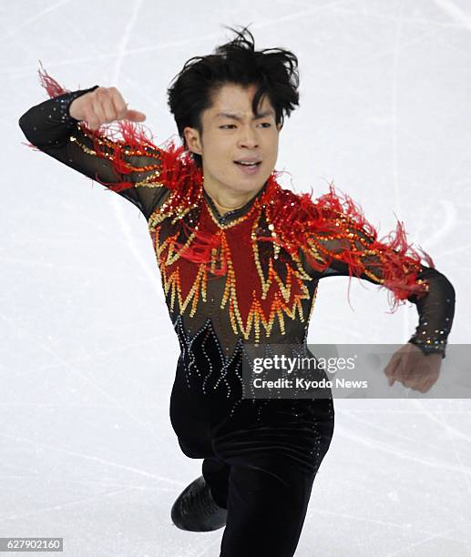 Russia - Tatsuki Machida of Japan, winner of the Cup of Russia and Skate America, performs in the men's free skating segment of the Winter Olympics...