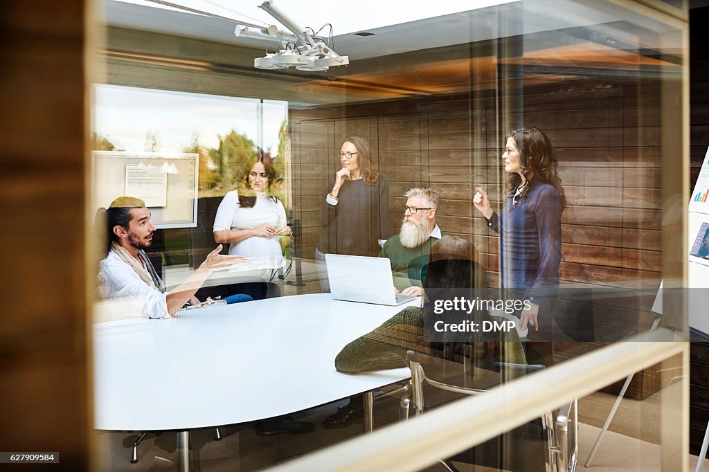 Corporate professionals meeting in conference room