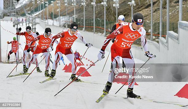 Russia - Japanese Nordic combined skiers -- Akito Watabe, Hideaki Nagai, Yoshito Watabe, and Taihei Kato -- conduct an official practice session at...