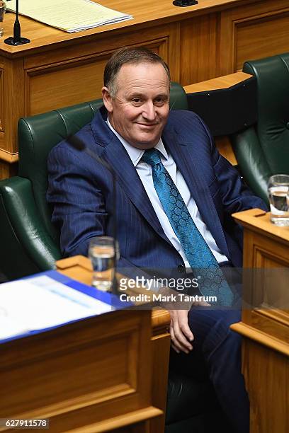 Prime Minister John Key listens to questions in the house on December 6, 2016 in Wellington, New Zealand. Prime Minister John Key announced his...