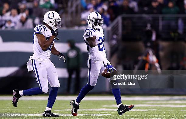 Darius Butler of the Indianapolis Colts celebrates after intercepting a pass intended for Brandon Marshall of the New York Jets in the second quarter...