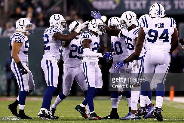 Darius Butler of the Indianapolis Colts celebrates after intercepting a pass intended for Brandon Marshall of the New York Jets in the second quarter...